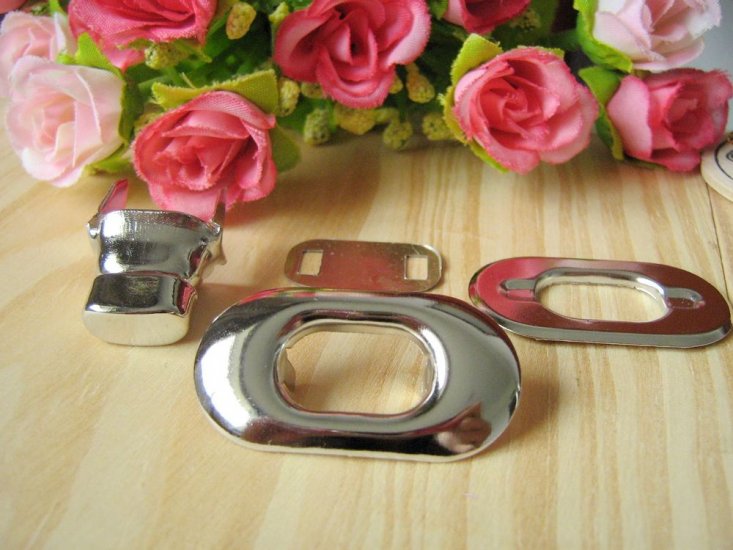Hardware supplier purse lock twist tie metal turn lock - Click Image to Close